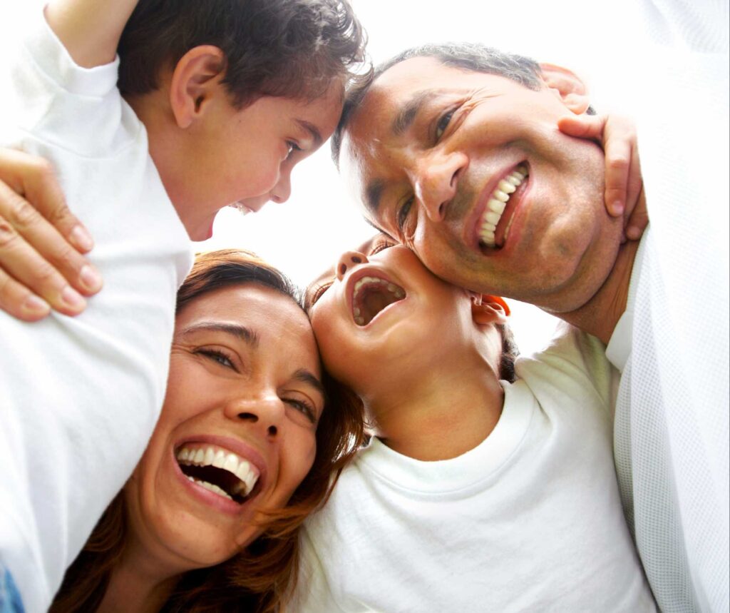 Happy family laughing together in a joyful close-up moment